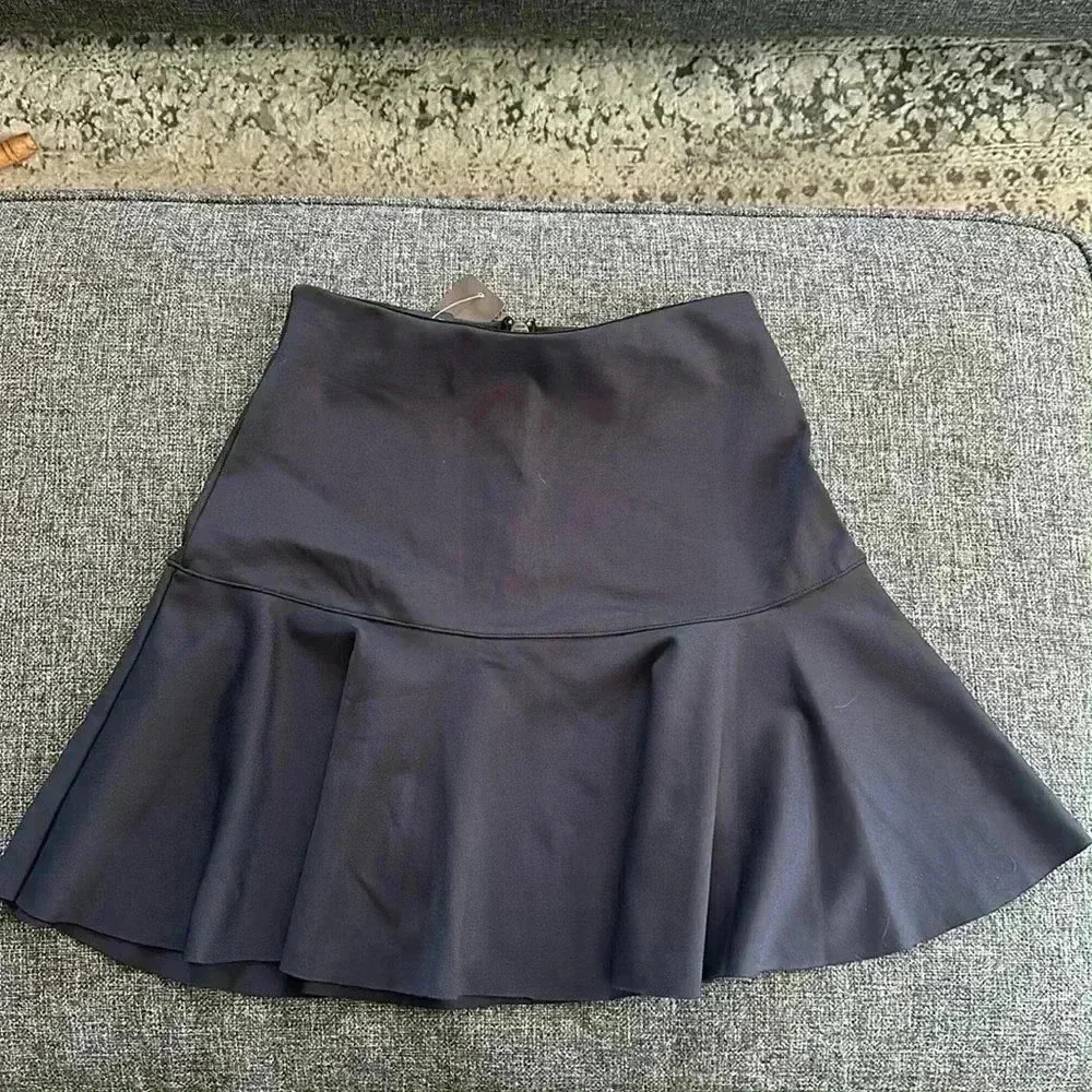 NWT size XS Bebe black buttery soft flowy skirt
